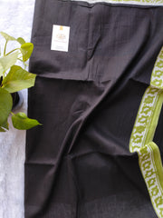 Black with green mulmul cotton saree.