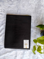 Black with green mulmul cotton saree.
