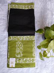Black with green mulmul cotton saree.